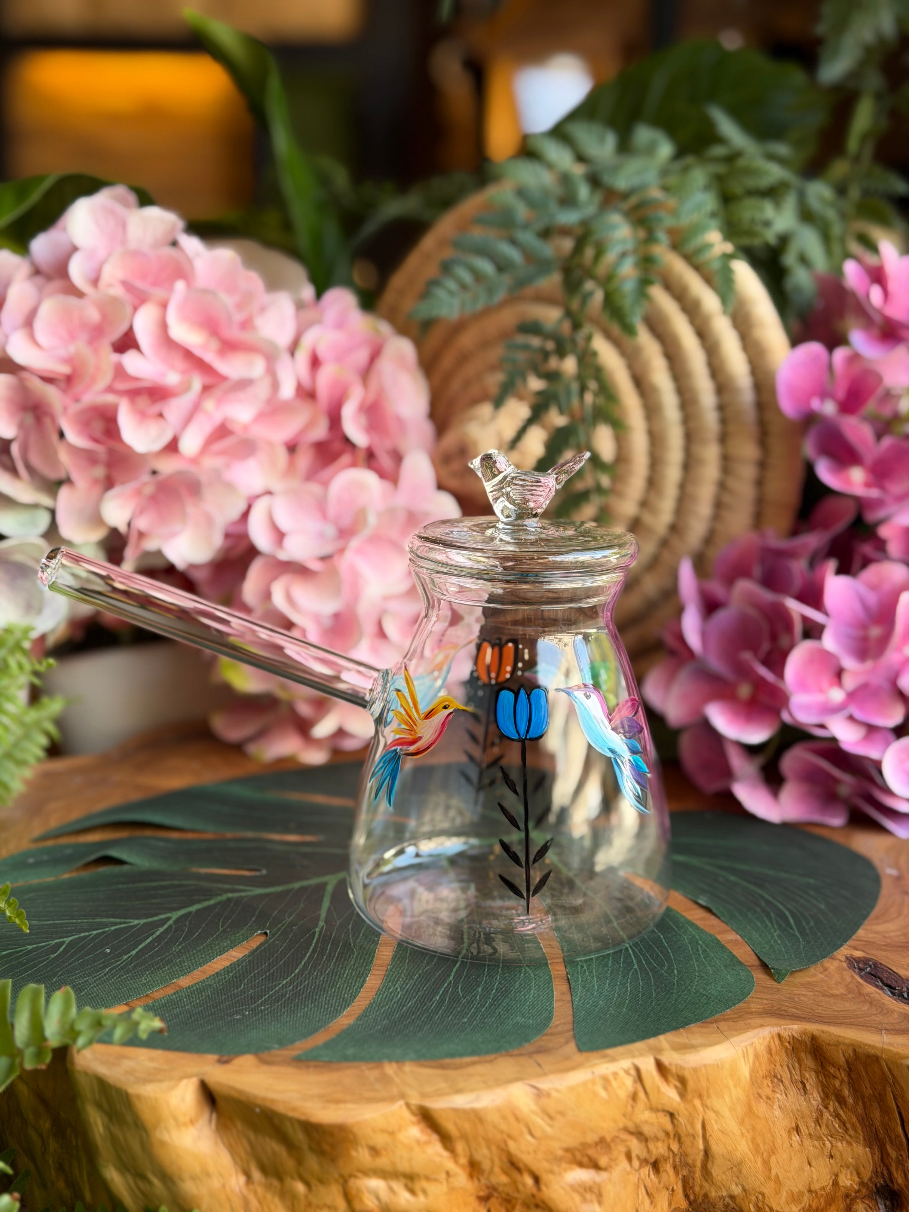 transparent coffee pot bird