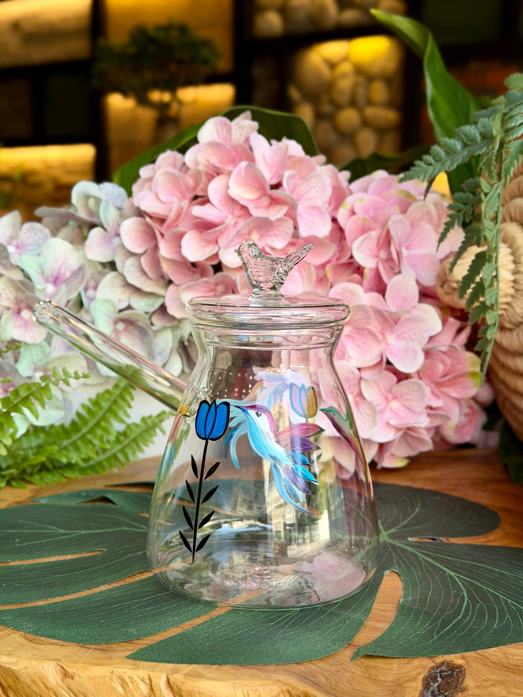 transparent coffee pot bird