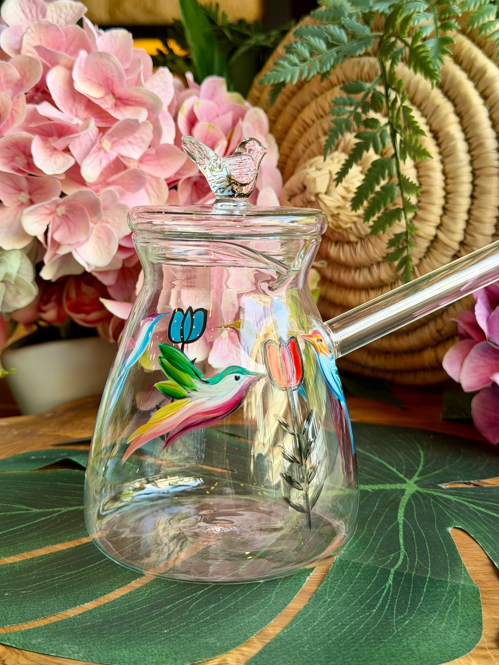 transparent coffee pot bird